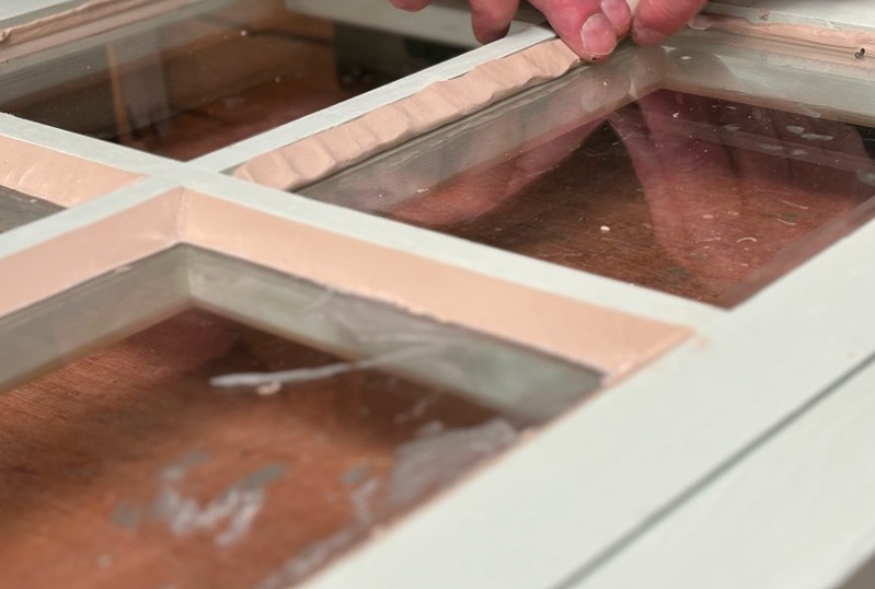 putty knife striking im glass