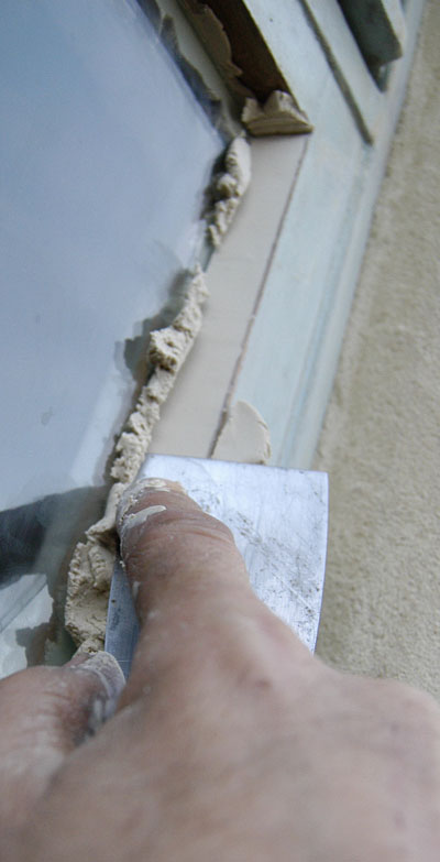 putty knife striking im glass