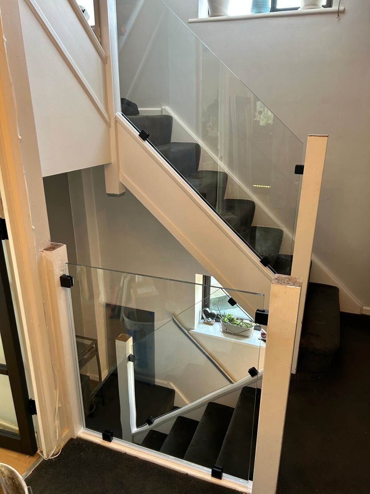 Bespoke glass balustrade fitted in Harefield by IM Glass