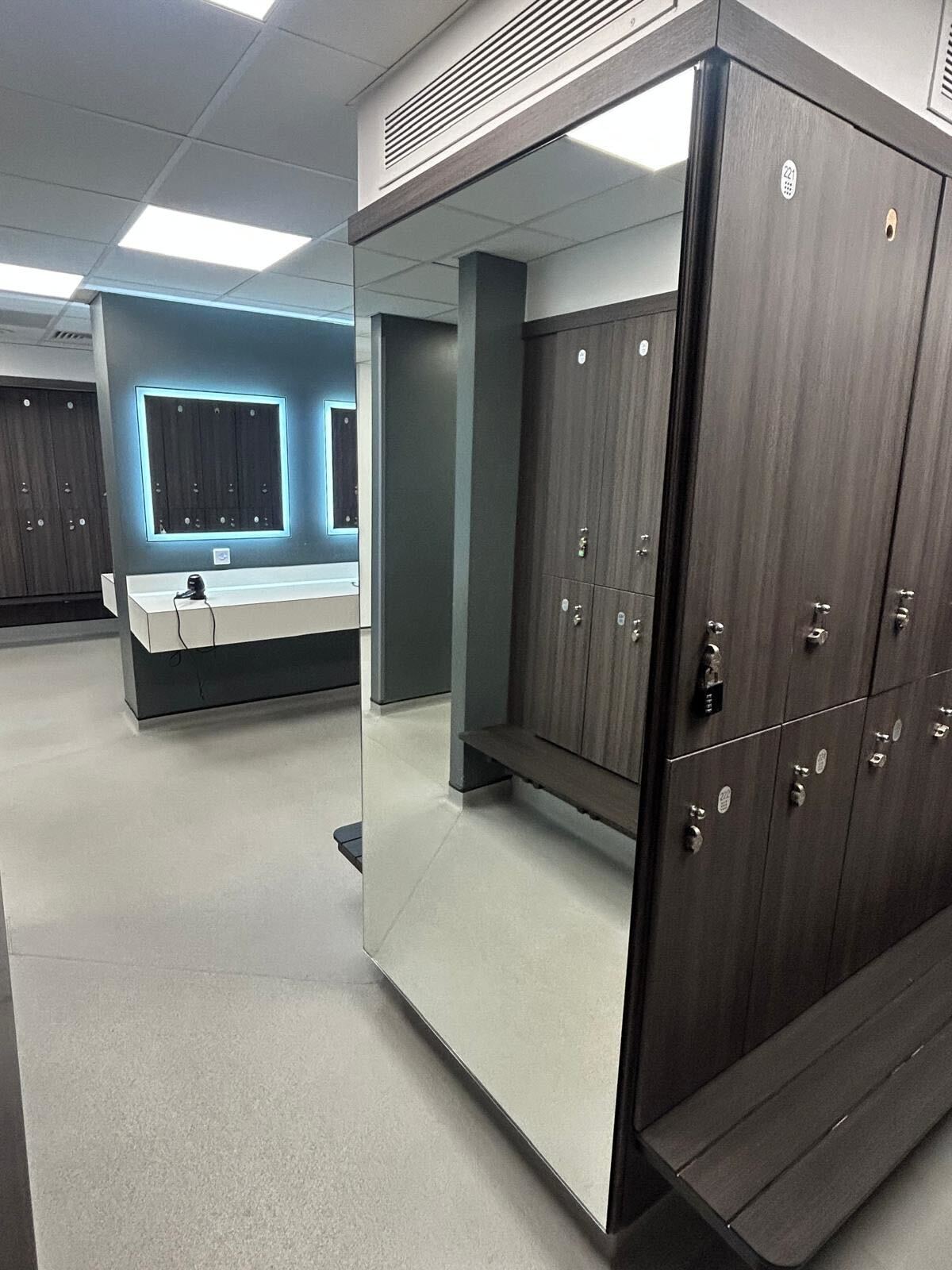 New mirror fitted in the women's changing room at Highgrove Swimming Pool in Ruislip by IM Glass