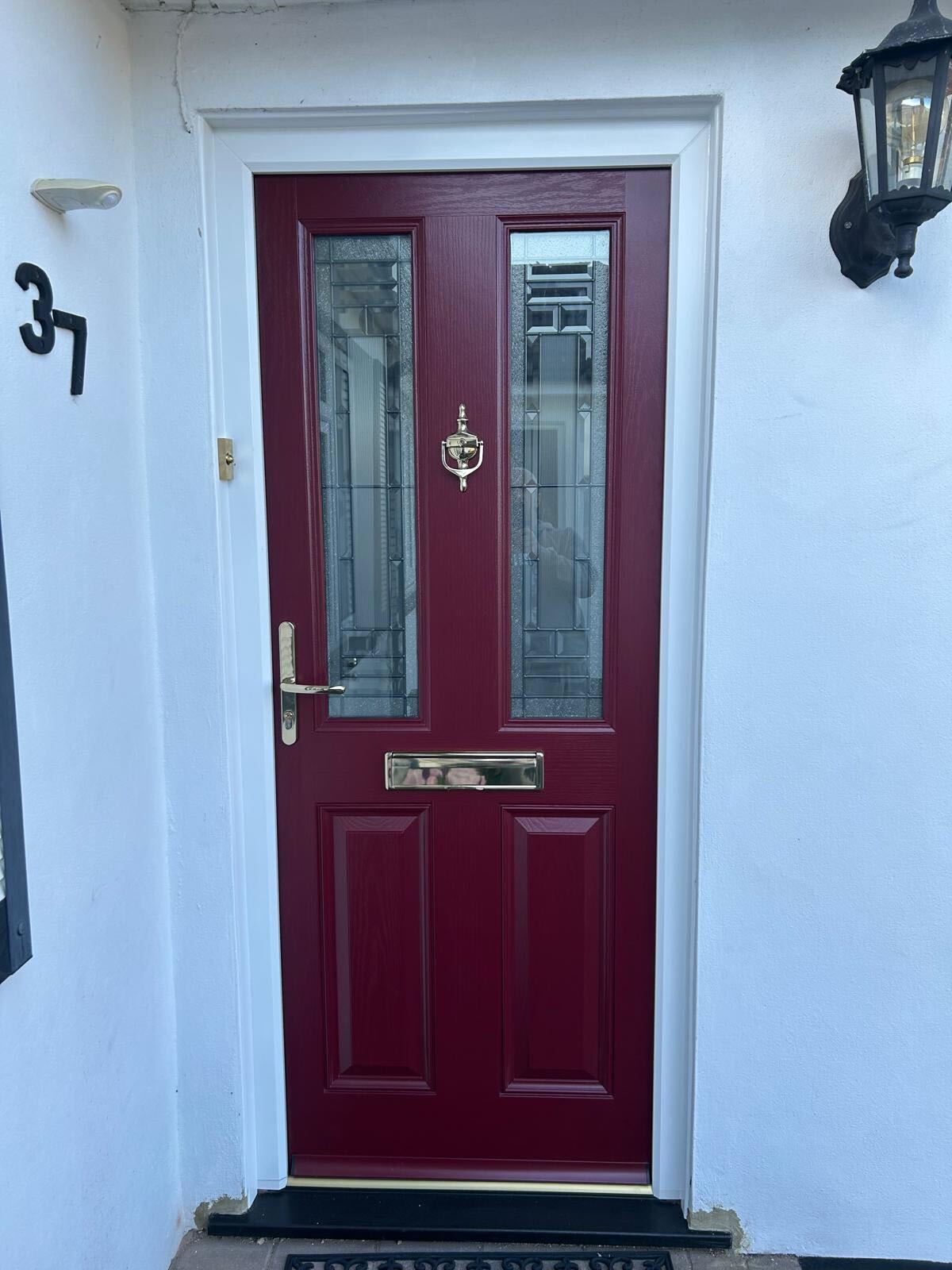 Ruby red composite door fitted in Harefield by IM Glass